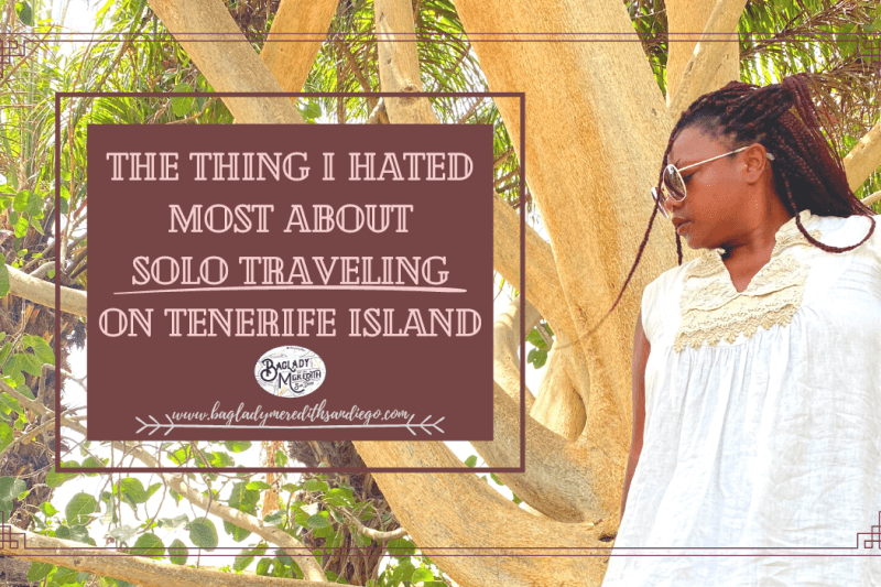 the thing I hated most about solo traveling on tenerife island pin with Meredith leaning against a beige trunked tree